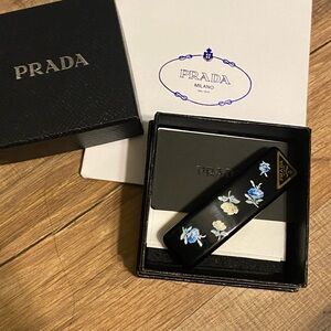 Prada Black hair clip with Blue and White Floral Design